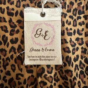 Boutique leopard flare pants- size L